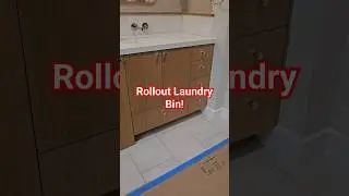 Rollout Laundry bin in custom Rift White Oak Cabinets