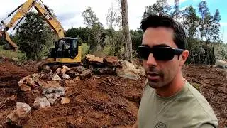 Excavator Moving and Stacking Boulders Part 2