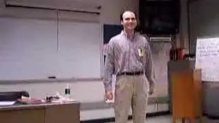 Teacher Clicking Heels in Classroom