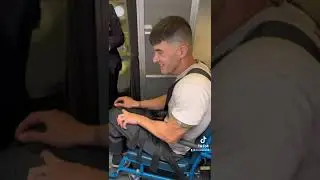 Getting onboard a plane in chairs made to contain Hannibal Lecter