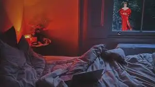 Brittany Broski recording The Broski Report from the other room on a rainy evening ASMR