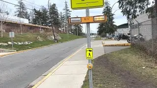 RRFBs mounted on Square Sign Posts at a college campus
