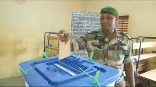 Mali soldiers cast ballots during early voting ahead constitution referendum