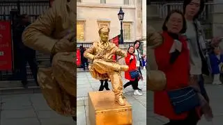 Naughty Goldman vs the brave kids seating on nothing. #art #livingstatue #floating