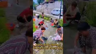 They wash clothes in the river every day,rural China life#china #rural #life