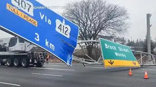 Fallen overhead sign shuts down part of Highway 401 in Whitby, Ontario