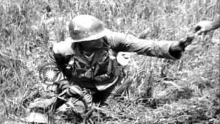 US soldiers of 305th Infantry of the 77th Division set up 60mm mortar in field, O...HD Stock Footage