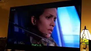 Die Another Day 2002 Film Miranda Frost holds a sword to Jinx Throat
