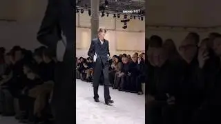First 𝗣𝗿𝗮𝗱𝗮's Men's Fall 2026 collection look at the #runway #fashiohit #prada #mfw