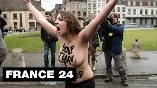 FRANCE - Topless FEMEN protesters target former IMF director Strauss-Kahn at pimping trial