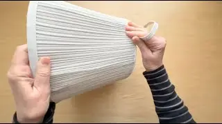 Buy a thrift store lamp shade for this BRILLIANT front porch idea!