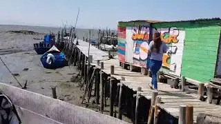 a rudimentary pier made by locals in Troy, Portugal
