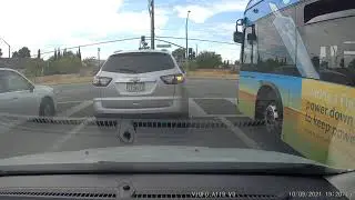 Bus Driver  Pulls into WRONG lane  cuts me off almost hits me ..