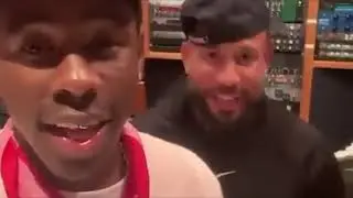 TYLER THE CREATOR GIVING DJ DRAMA HIS FLOWERS