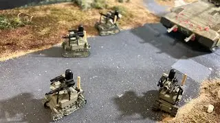 We are the robots!  1/72 mini battle tanks from the land of plenty to keep the Merkava tanks safe!