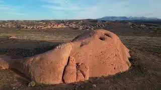Sitting on a big rock near sunset, overlooking the La Sal Mountains, Utah