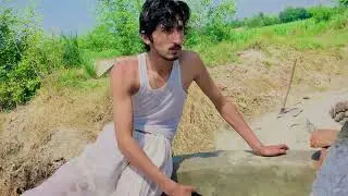 . young boy tube well Swimming in village