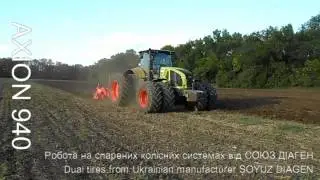 CLAAS AXION 940 tractor on twin wheels