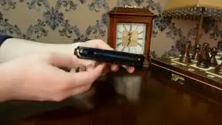 Фирменный откидной чехол-флип для Sony Xperia E1/ E1 Dual D2005/ D2105 черный кожаный