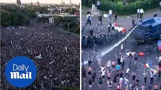 Police deploys water canon in Bucharest as hundreds rally