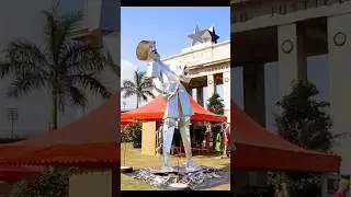 Tei Huagie's 'Boy with Flower' at #chalewote2023 A Shimmering Metal Masterpiece #Art #sculpture