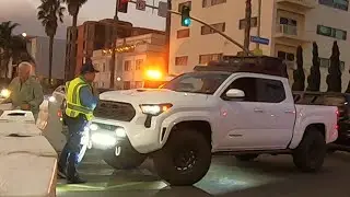 Frustrated Residents Clash with Police over  Road Closure for the Palisades Fire