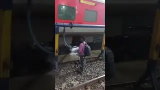 Man Uses Railway Track Water Hose to Spray Train Passengers &ndash; Viral Video