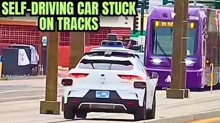  Waymo passenger jumps out of self-driving car after it stops on rail tracks near oncoming train