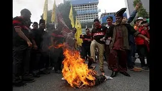 Palestinian 'day of rage' protests spread globally
