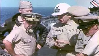 Admiral John Hyland and other US Navy officers survey fire damage aboard the USS ...HD Stock Footage