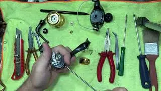 Como desmontar e lubrificar o molinete elite 1000 #molinete #consertos #elite #pesca #pescaria