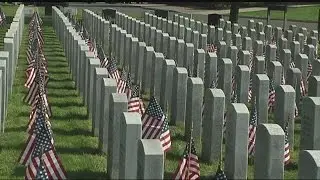 American Flags placed at graves at Veterans Memorial Cemetery in Agawam