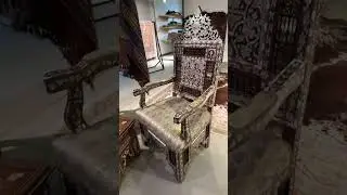 Elegant Chair inlaid with mother of pearl on walnut.