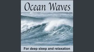 Calming Waves on a Pebble Beach