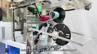 Vertical packing machine for metal parts:Vibrating disc sorting, rust-preventive oil spraying,label