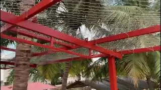 Roof Top Fencing to protect damage from coconut falls on roofing sheets