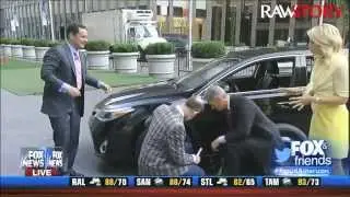 Fox & Friends hosts try to change a car tire -- and fail hilariously