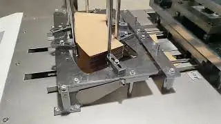 Compact embossing machine for paper cup and paper cup sleeve.
