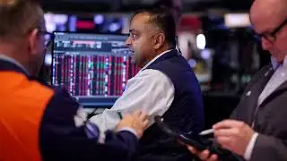 Wall Street sinks as tech rout deepens on AI angst
