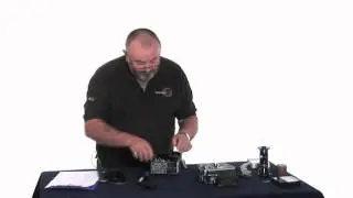 Loading a Bolex film camera