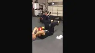 Guy and his Reverse Crunches at Wolf Fitness Systems