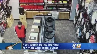 Man Stuffs Guitar In Pants