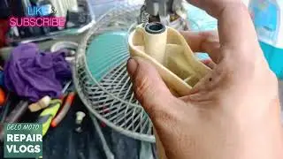 old model electric fan.. national stan fan.. broken neck..