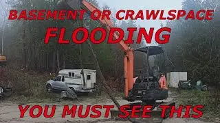 Roots in drain flood house 23 foot long pulled out with mini excavator. Hitachi 35u