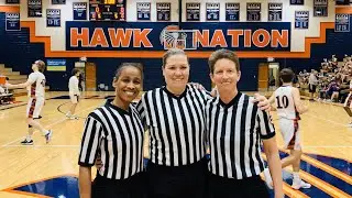 All female referee crew works Sunflower League basketball game for first time