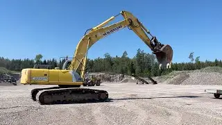 K&ouml;p Gr&auml;vmaskin New Holland E385 med tandskopa p&aring; Klaravik