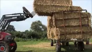 Unloading big bale wheat straw.Part 1