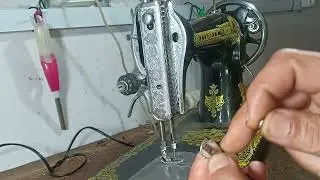 SENGER.....l'arr&ecirc;t de l'aiguille de la machine &agrave; coudre