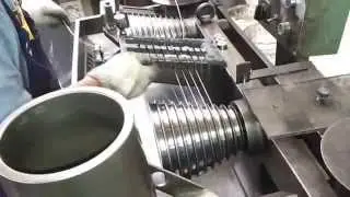 Sterling Silver wire being drawn/reduced from a square to round.