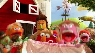 A baker (Martin P. Robinson) advertises the fair to Elmo and Big Tomato, a perfect outlet for her to